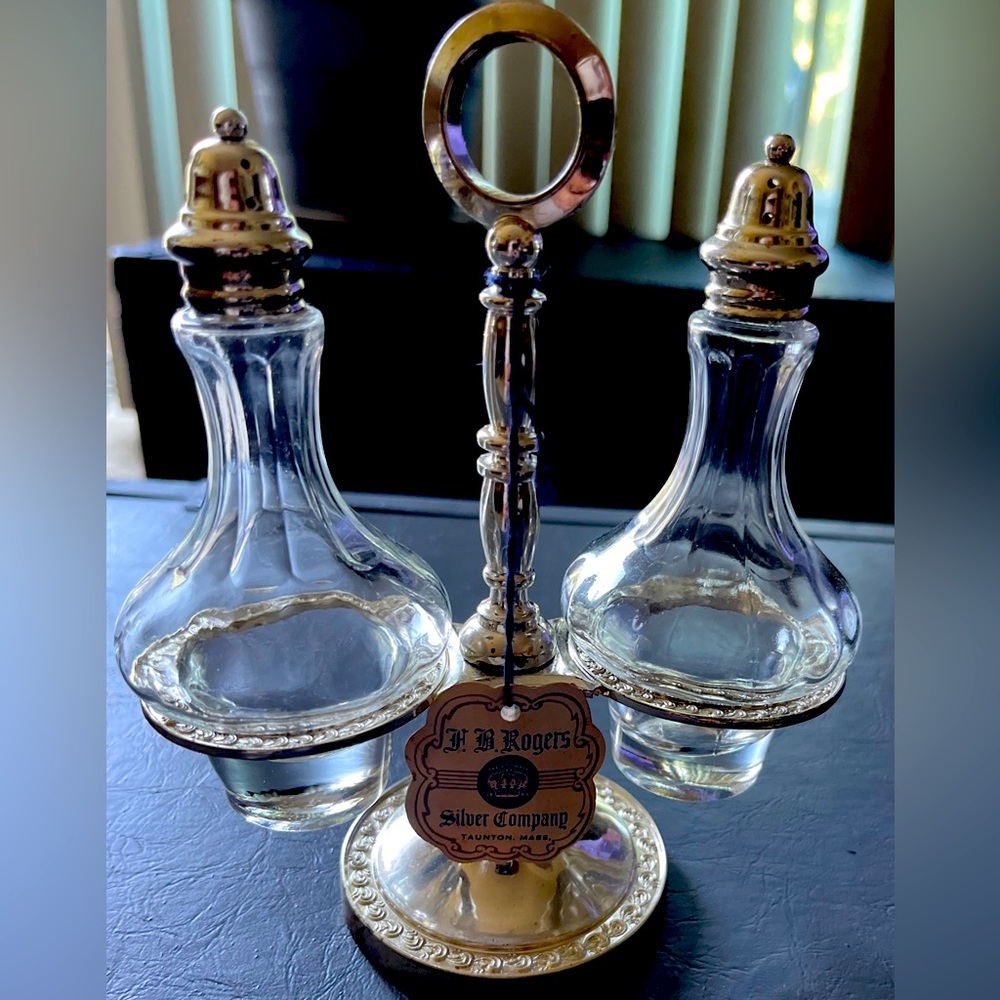 F.B. Rogers Silver Co. vintage silver salt and pepper shakers with stand w/tags.